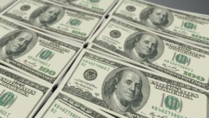 El peso mexicano sube frente al dólar a 20.74